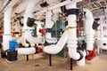 Insulated industrial piping in an HVAC system.