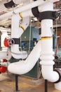 Insulated industrial piping in an HVAC system.
