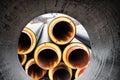 Insulated pipe. Large metal pipes with a plastic sheath at a construction site. Modern pipeline for supplying hot water and Royalty Free Stock Photo