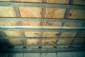 Insulated wooden floor between floors in a private house. Protection of sound and heat insulation with a vapor barrier and a hydro