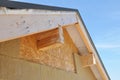 Insulating with Mineral Rock Wool Attic Roof Outdoors. Close up on exterior insulation layers of mineral wool insulation, house