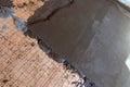 Floor repair, installation of concrete screed guides. Setting the level for pouring concrete. Repair and rough finishing Royalty Free Stock Photo