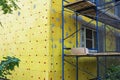 Insulation of the walls of a multi-storey building, Thermal insulation of the exterior walls of the house Royalty Free Stock Photo