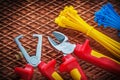 Insulation wire strippers cutter tying cables on dielectric mat Royalty Free Stock Photo