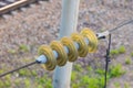 Insulator on a high-voltage power line Royalty Free Stock Photo