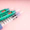 Insulin injection needle or pen for use by diabetics, insulin and glucometer Royalty Free Stock Photo