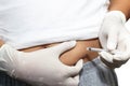 Insulin injection subcutaneous at abdomen. Royalty Free Stock Photo