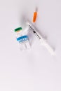 Insulin vial and uncapped syringe on white background with copy space Royalty Free Stock Photo