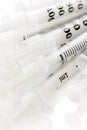 Insulinic syringes on a white background