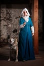 Insulted Nun with Dog Royalty Free Stock Photo