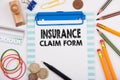 Insurance Claim Form. Office desk with stationery Royalty Free Stock Photo