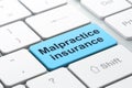 Insurance concept: Malpractice Insurance on computer keyboard background