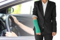 insurance concept, injured businesswoman with green cast on hand