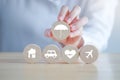 Hand holding umbrella icon for security symbol and House, Car, Health care and travel icon. Royalty Free Stock Photo