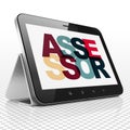 Insurance concept: Tablet Computer with Assessor on display Royalty Free Stock Photo