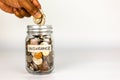 Insurance Glass Jar Money Concept