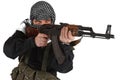 Insurgent dressed in black uniform and black and white shemagh with AK 47 rifle Royalty Free Stock Photo