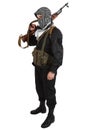 Insurgent dressed in black uniform and black and white shemagh with AK 47 rifle Royalty Free Stock Photo