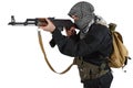 Insurgent dressed in black uniform and black and white shemagh with AK 47 rifle Royalty Free Stock Photo