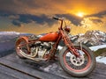 intage motorcycle on top of a mountain ridge at sunset