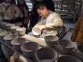 Intangible Cultural Heritage Inheritor making bamboo handcrafts