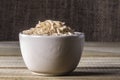 Integral rice on glass bowl isolated on wooden table