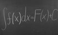 Formula from mathematics written on the board.