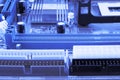 Integrated semiconductor microchip microprocessor on blue circuit board representative of the high tech industry and computer scie