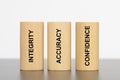 Integrity, accuray and confidence printed on three pillars Royalty Free Stock Photo
