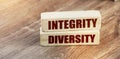 Integrity Diversity words written on wooden blocks. Equal rights social concept Royalty Free Stock Photo