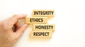 Integrity ethics honesty respect symbol. Concept word Integrity Ethics Honesty Respect on block. Beautiful white background.
