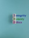 Integrity honesty ethics symbol. Concept words Integrity honesty ethics on wooden cubes. Beautiful blue background. Business and Royalty Free Stock Photo