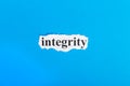 Integrity text on paper. Word Integrity on torn paper. Concept Image