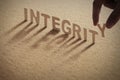 INTEGRITY wood word on compressed board Royalty Free Stock Photo