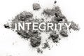 Integrity word made in ash, dust, filth as bad and corrupted virtue