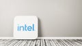 Intel App Icon on Wooden Floor Against Wall