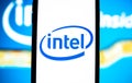 Intel logo on smartphone screen. Royalty Free Stock Photo