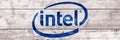 Intel sign. Close-up Intel logo on wooden surface