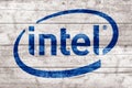 Intel sign. Close-up Intel logo on wooden surface Royalty Free Stock Photo