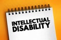 Intellectual disability - generalized neurodevelopmental disorder, text concept on notepad