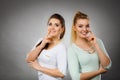 Two women thinking about something Royalty Free Stock Photo