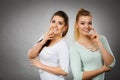 Two women thinking about something Royalty Free Stock Photo