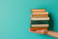 Intellectual Inspiration: Woman Holds Books, Conveying Education, Science, Knowledge, and the Joys of Learning Royalty Free Stock Photo