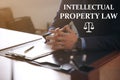 Intellectual property law. Jurist at table in office