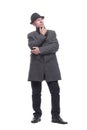 intelligent man in a hat and autumn coat. isolated on a white background. Royalty Free Stock Photo