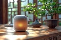 intelligent speaker with voice control. A smart speaker stands on a table in the interior Royalty Free Stock Photo