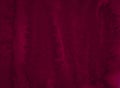 Intense burgundy color of hand-painted watercolor stains. Dark red abstract background Royalty Free Stock Photo