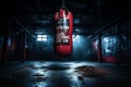 Intense Clash: Red Punching Bag Meets Black and Blue Boxing Gloves