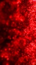 Intense glowing red particles exploding outward in a vibrant energetic abstract composition Royalty Free Stock Photo