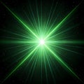 Intense Green Laser Beam Explosion Against Starry Black Background starburst light rays Royalty Free Stock Photo